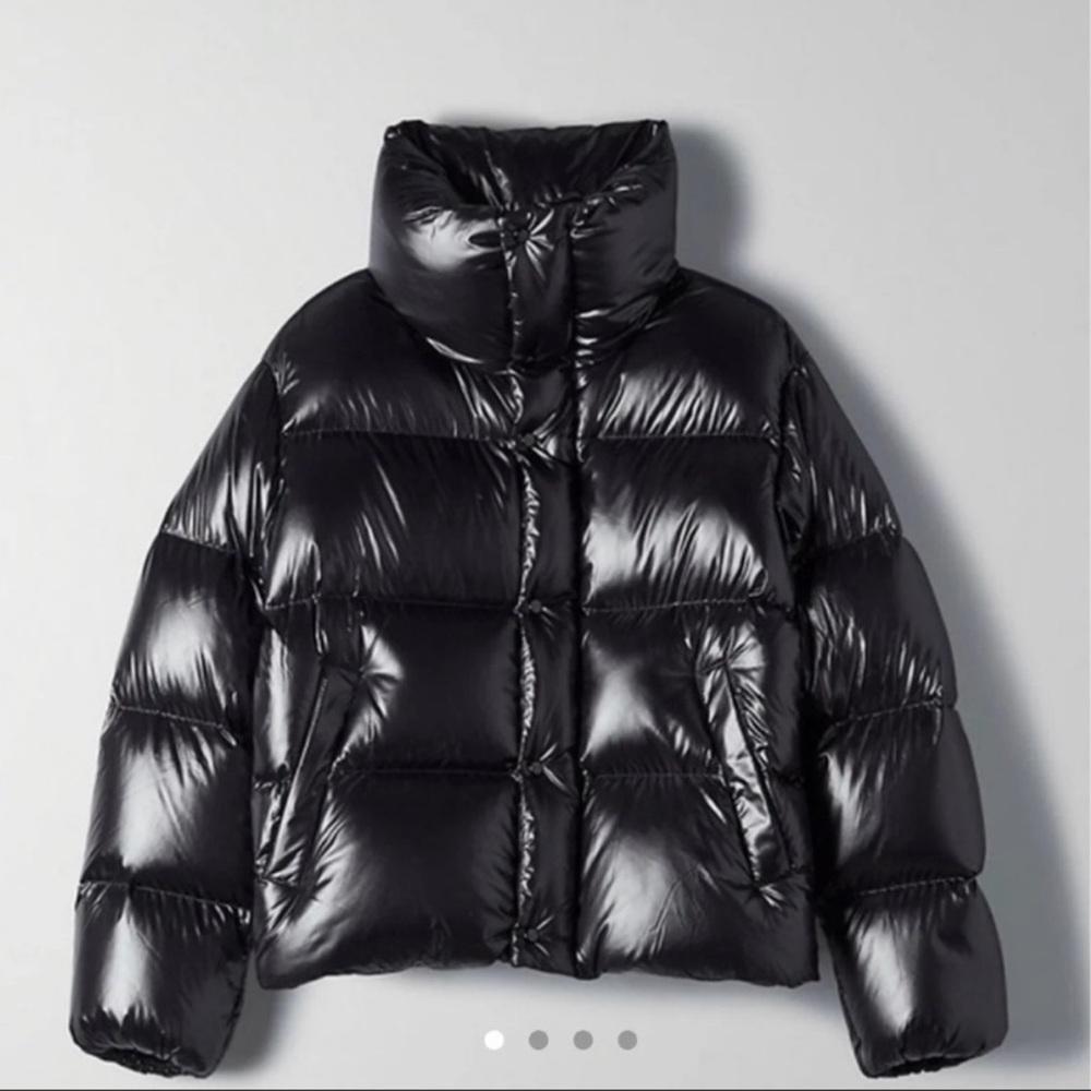 Black shiny TNA mega puff shorty in size small. Excellent condition. Barely worn